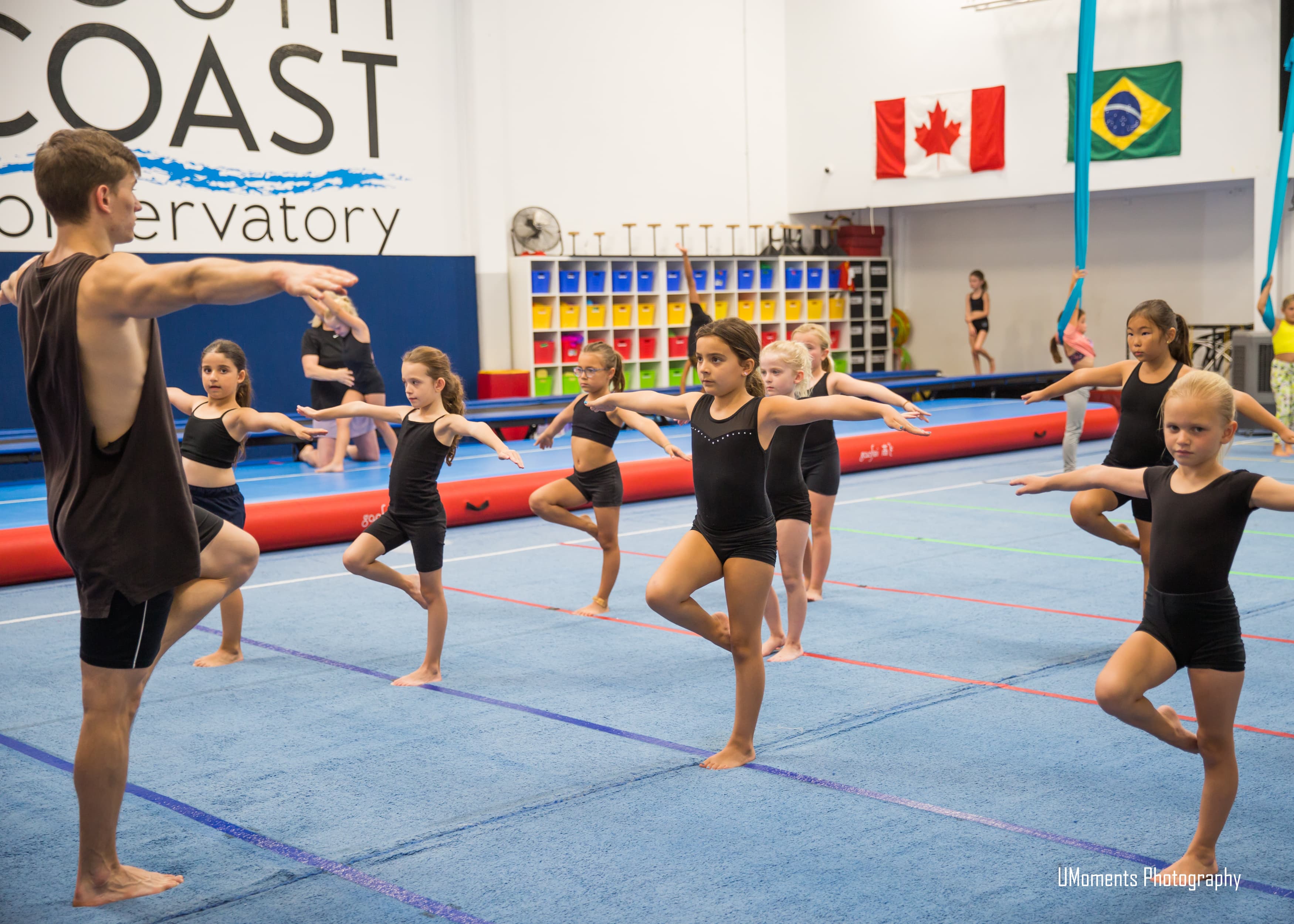 A diverse group of young dancers learning together in class